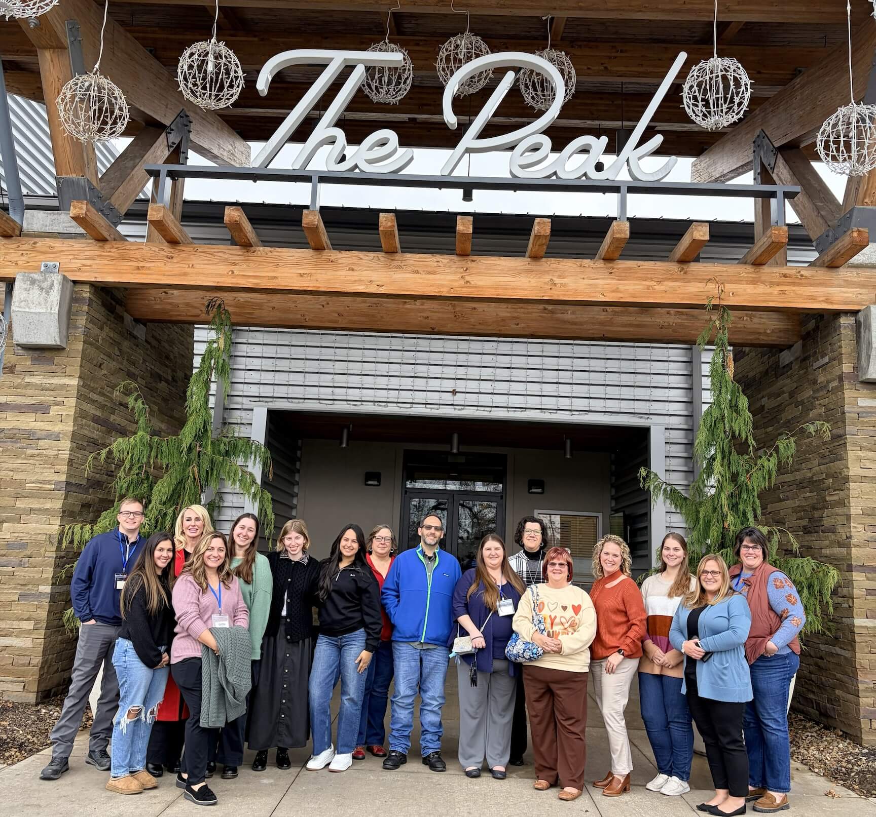Leadership Fayette Class Visits The Peak Leadership program participants posing together outside Nemacolin's The Peak during a community leadership group session.